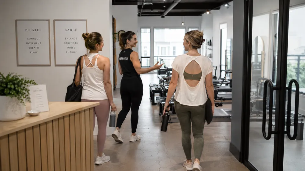 An instructor welcoming a new member